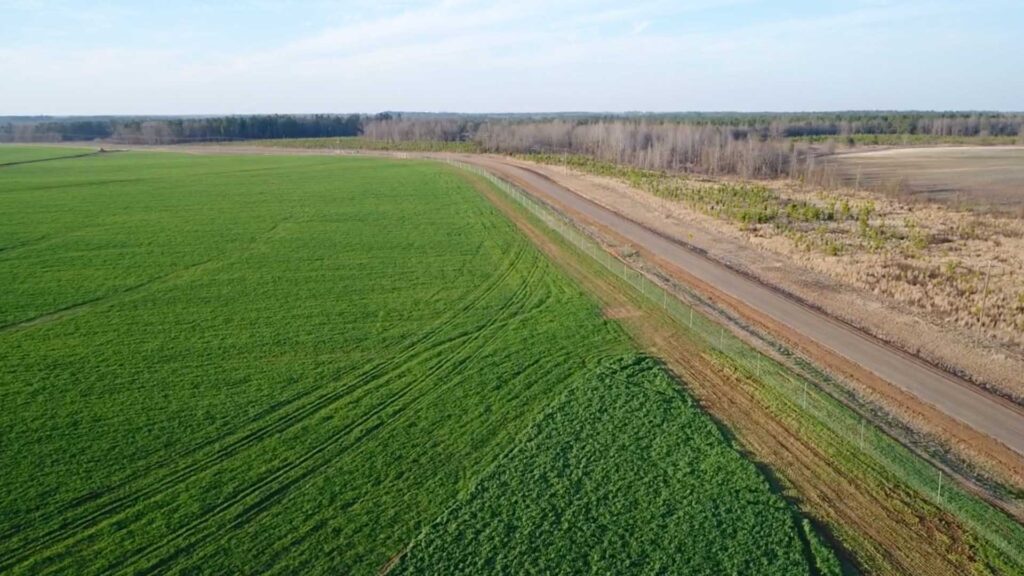 view from above of a large property with fencing